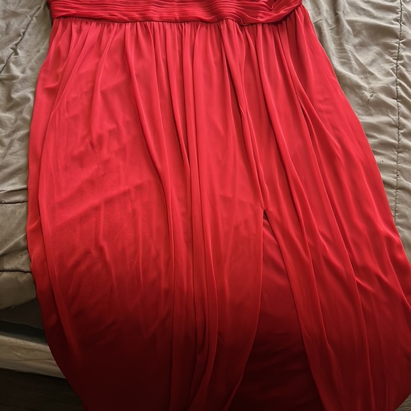 It’s the 2nd bridesmaid dress in candy apple red and it has a split on side - Picture 2 of 6